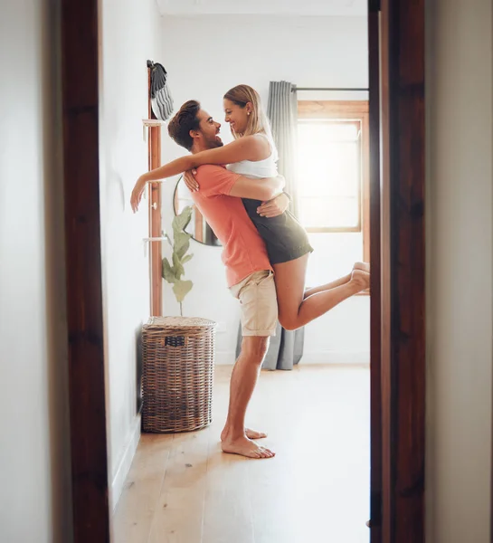 Happy Young Boyfriend Holding Girlfriend Arms Lifts Her While Look — Foto Stock