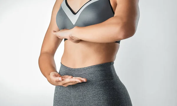 Studio Shot Unrecognisable Woman Framing Her Stomach Her Hands Grey — Stockfoto
