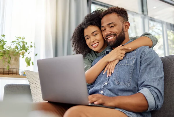 Young Happy Mixed Race Couple Smiling While Using Laptop Together — Stok fotoğraf