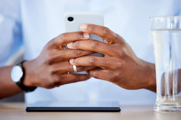 Black Businessman Using Cellphone His Desk Office Hands Holding Phone — Stok fotoğraf