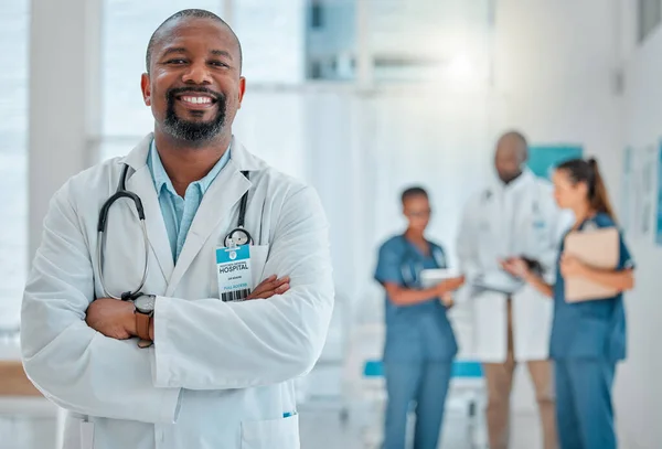 Mature African American Male Doctor Standing His Arms Crossed While — Foto Stock