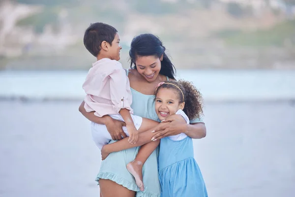 Loving Mixed Race Mother Hugging Her Children While Enjoying Family — Stock fotografie