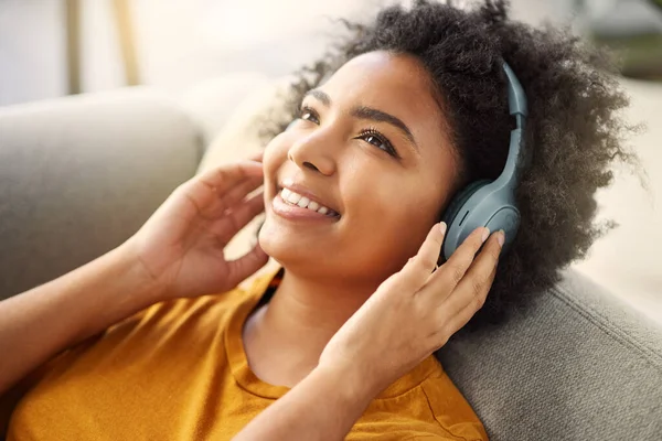 Young Woman Listening Music While Relaxing Home — 图库照片