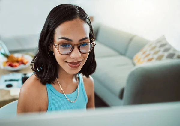 Stylish and elegant modern business woman working in an office or from home, while looking trendy, fashionable and edgy.