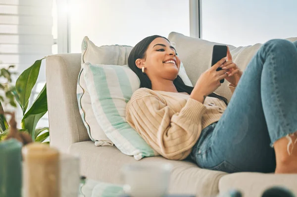 Attractive Young Woman Texting While Chilling Home — Fotografia de Stock