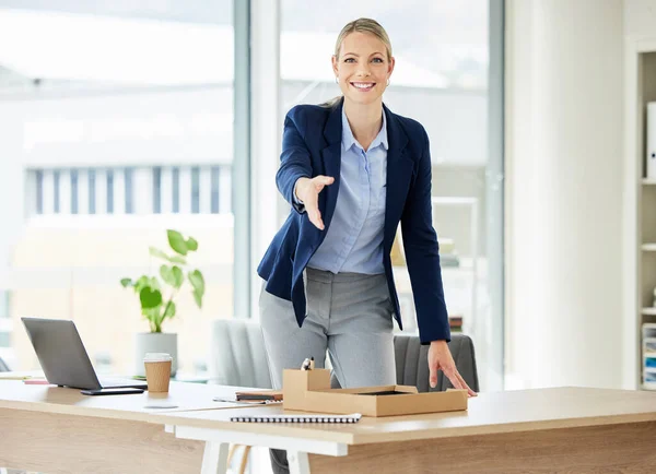 Closeup of caucasian business woman extending hand forward to greet welcome with handshake. Networking and meeting to agree on deal or offer. Consulting and collaborating on negotiation for job hiring