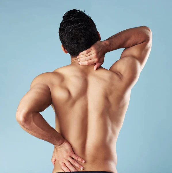 Rearview Young Mixed Race Man Standing Shirtless Studio Isolated Blue — Foto Stock