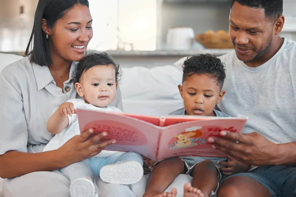 Young Family Happily Bonding Together While Reading Book Sofa Home — Fotografia de Stock