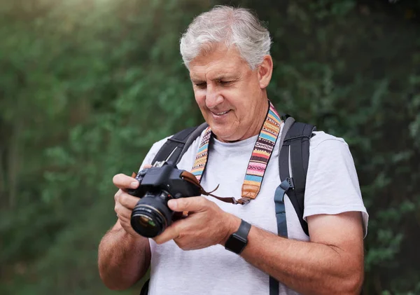 Mature Caucasian Man Taking Pictures His Camera While Out Hiking — Stok fotoğraf