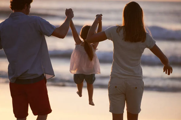 Mother Father Swinging Daughter Air Beach — Stock Photo, Image