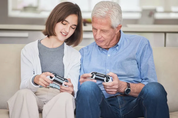 Mature Man Bonding His Grandchild While Playing Video Games Sofa — Foto de Stock
