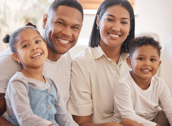 Portrait Smiling Couple Little Kids Home Mixed Race Mother Father — Fotografia de Stock