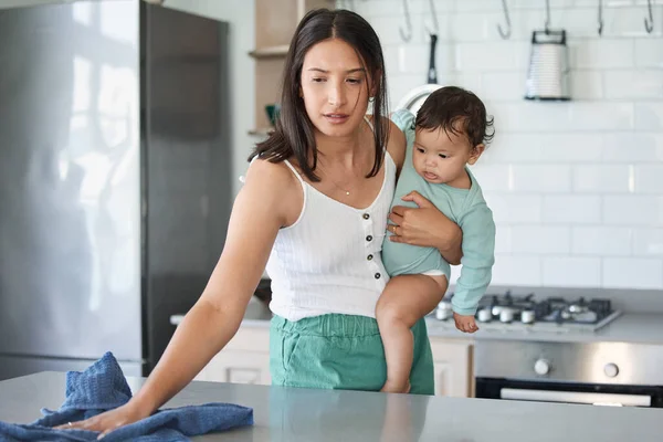 Woman Cleaning Her House Her Baby Her Arm — Stock Fotó
