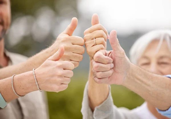 Unrecognizable Family Showing Thumbs — Φωτογραφία Αρχείου