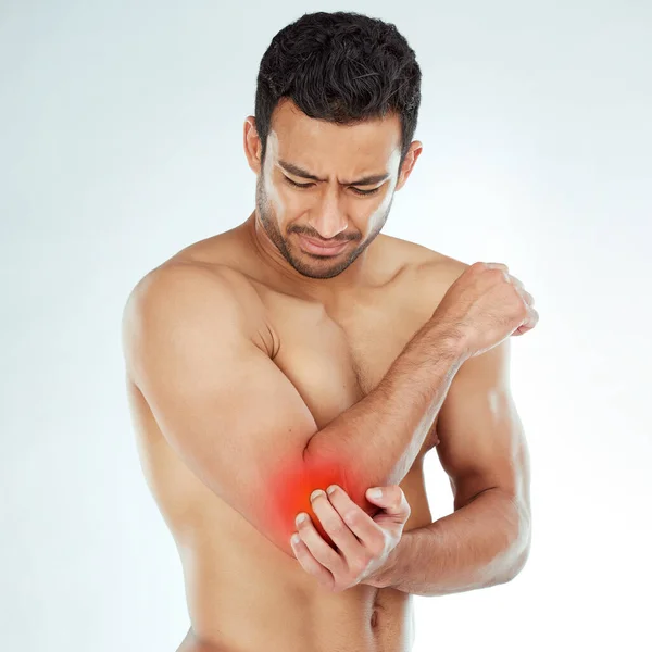 Man Clutching His Elbow Pain Studio Background — Foto Stock