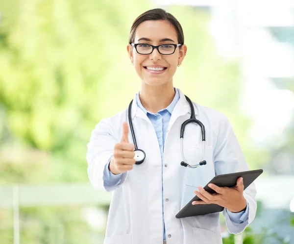 Young Female Hispanic Doctor Wearing Labcoat Smiling While Using Digital — ストック写真