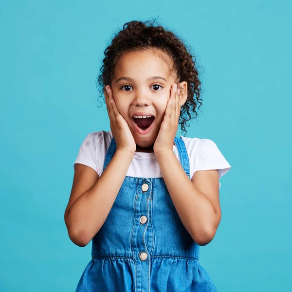 Little Girl Looking Surprised While Posing Blue Background — Foto Stock