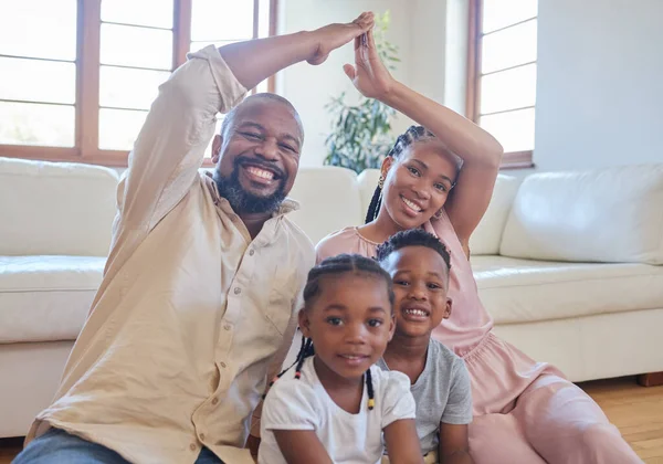 Young African American Couple Sitting Children Home Making House Gesture — ストック写真