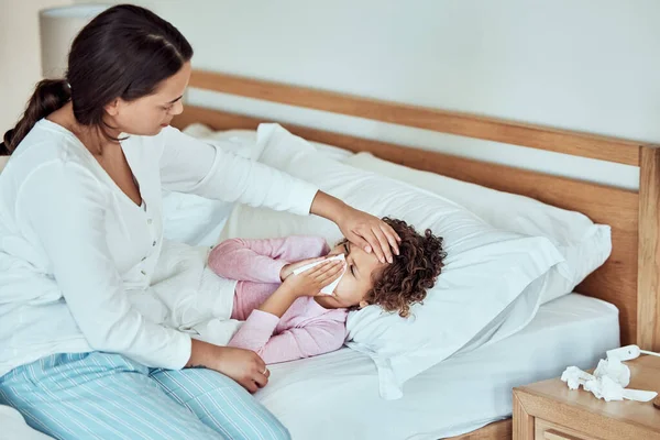 Sick Mixed Race Girl Blowing Runny Nose Tissues Bed Home — Stok fotoğraf