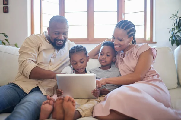 Young African American Family Sitting Sofa Together Smiling While Using — Foto de Stock