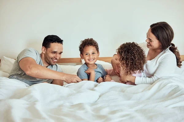 Mixed Race Family Lying Bed Smiling Playing Latino Parents Having — Fotografia de Stock