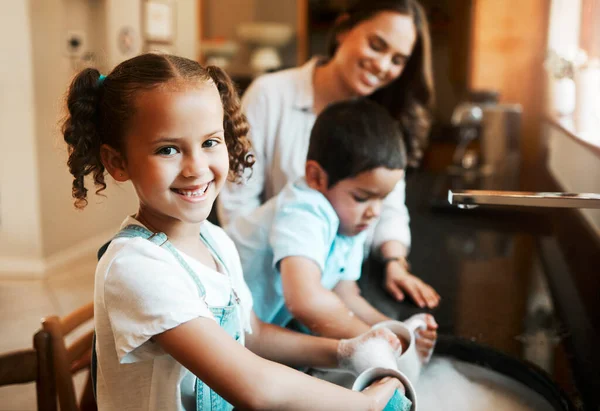 Happy Cheerful Little Mixed Race Girl Helping Her Mother Wash — Stockfoto