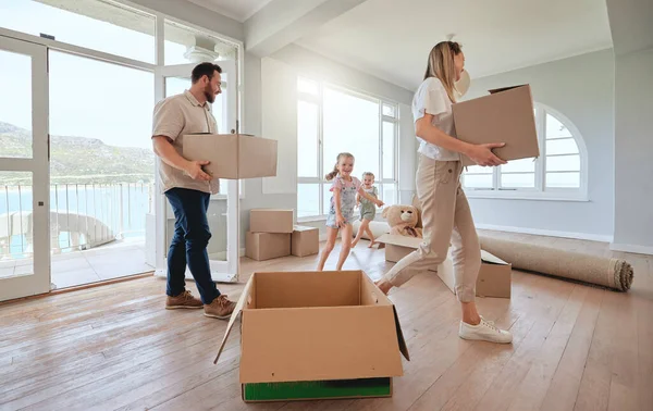 Making our dreams come true. a young family moving into their new home