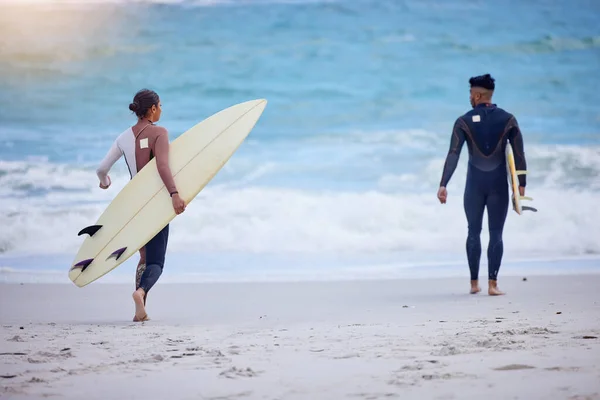 Lets Find Good Wave Rearview Shot Young Couple Walking Sea — Φωτογραφία Αρχείου