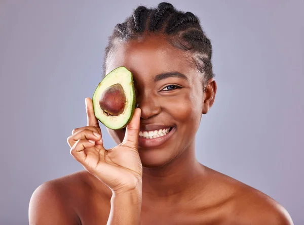 Secret Lies Avocado Studio Shot Beautiful Young Woman Holding Halved — Stockfoto