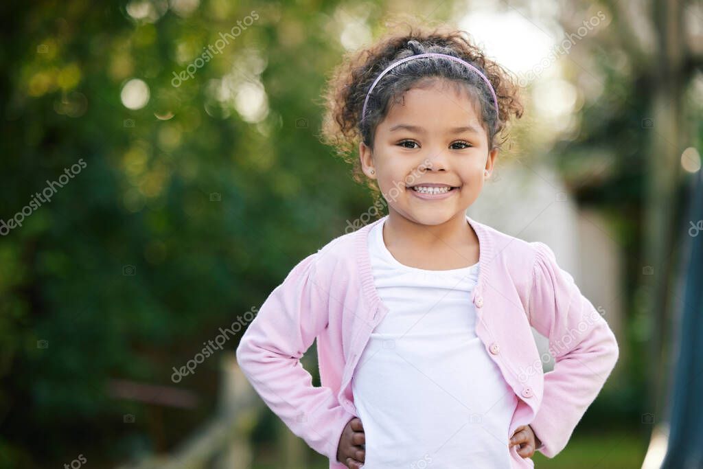 Inside every child is a rainbow waiting to shine. Portrait of an adorable little girl having fun outdoors