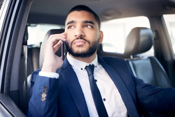 Young Businessman Talking Cellphone While Driving Car — Fotografia de Stock
