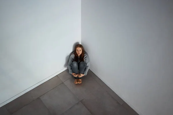 Depressed Young Woman Sitting Corner Alone — ストック写真