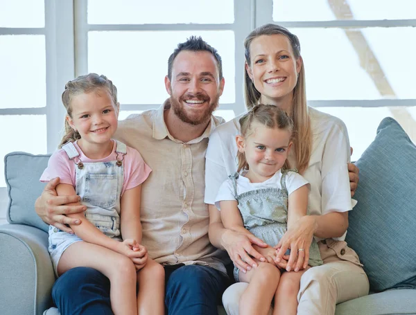 Love and appreciate everyone in your life. a young family relaxing together at home