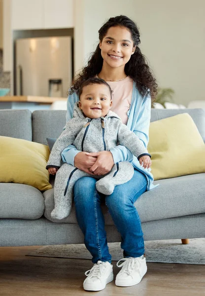 Of all my achievements, Im most proud of him. a young mother bonding with her baby boy on the sofa at home