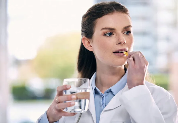 Even Doctors Need Vital Boosters Female Doctor Taking Tablet While — 스톡 사진