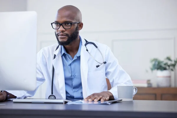 Theres Always Something Needs His Attention Young Male Doctor Using — Foto Stock