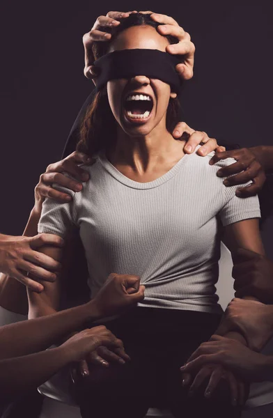 Post traumatic stress injury isnt a disease. a young woman experiencing mental anguish and screaming against a black background