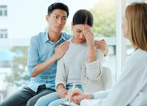 Drastic Measures Mature Doctor Comforting Young Couple While Delivering Some — Stockfoto