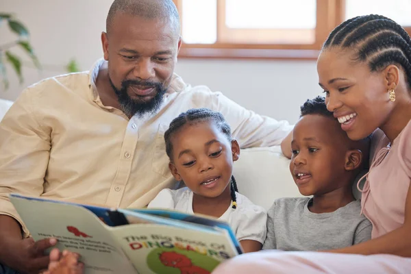 Young African American Family Sitting Sofa Together Smiling While Reading — Foto de Stock
