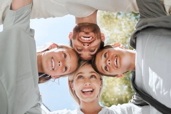 Call us crazy, were crazy about family. a couple and their two children standing together in a huddle