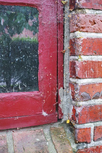 Closeup Abandoned Red Window Covered Spiderwebs Neglect Poverty Economic Crisis — Foto Stock