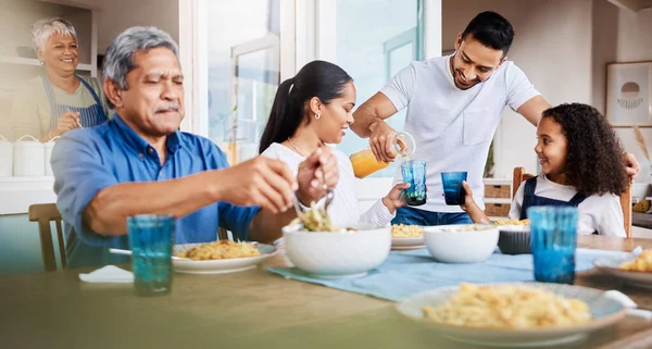 Sundays are for family lunches. a happy family having lunch together at home