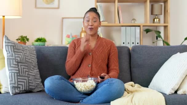 Young Woman Watching Exciting Movie Alone Couch Home Surprised Black — Vídeo de stock