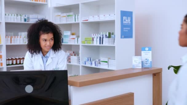 Female Pharmacist Helping Customer Pay Her Medication Card Machine Pharmacy — Vídeo de Stock