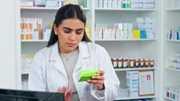 Pharmacist Confirming Medicine Order Expiry Date Making Notes Computer Pharmacy — Vídeo de stock
