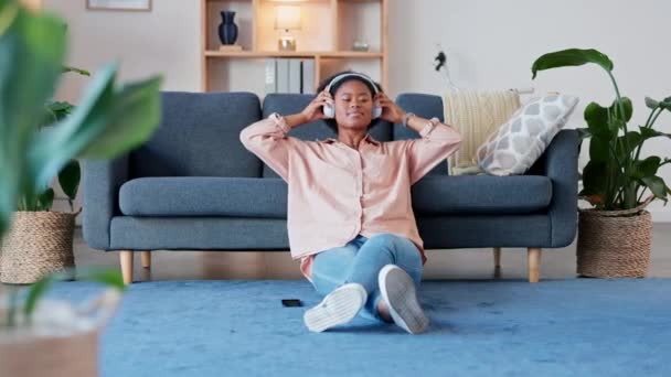 Woman Listening Music Enjoying Songs Wireless Headphones Sitting Living Room — Video