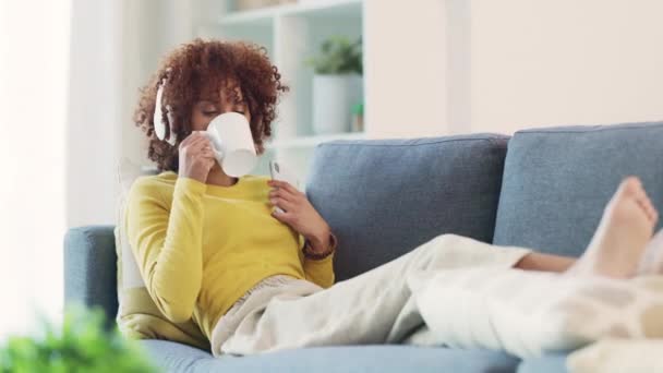 Woman Using Phone Text Friends Wearing Headphones Listen Music While — Video Stock