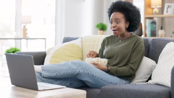 Happy African American Woman Streaming Online Movies Laptop While Snacking — Vídeo de Stock