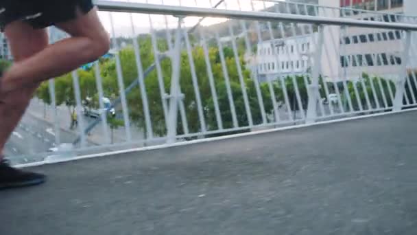 Two Fit Athletes Running Jogging Bridge City Outdoors Closeup Legs — Video Stock