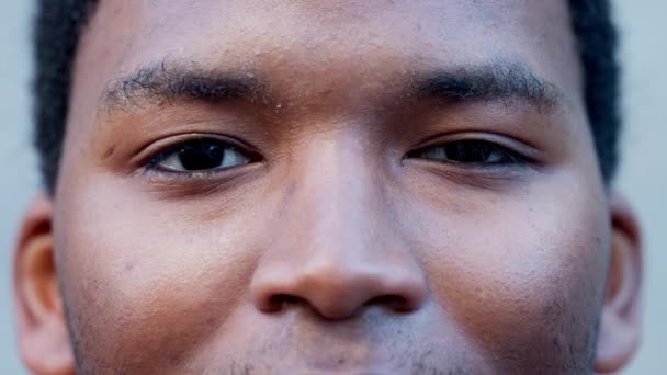 Closeup Portrait Confident Black Man Blinking Slow Motion Young African — Vídeos de Stock